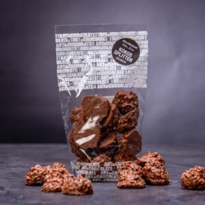 Kousky kokosu v luxusní mléčné čokoládě 150 g